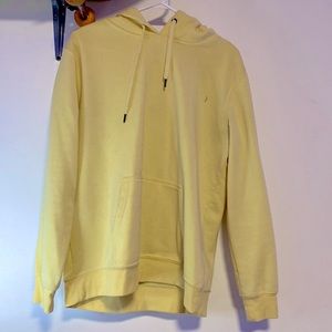 in fairly used condition pastel warm yellow hoodie